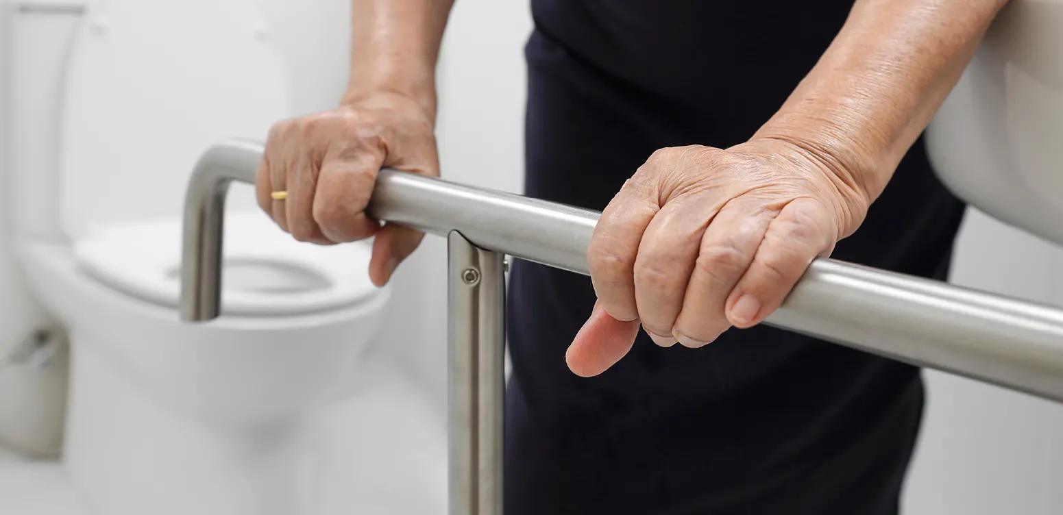 person using handrail