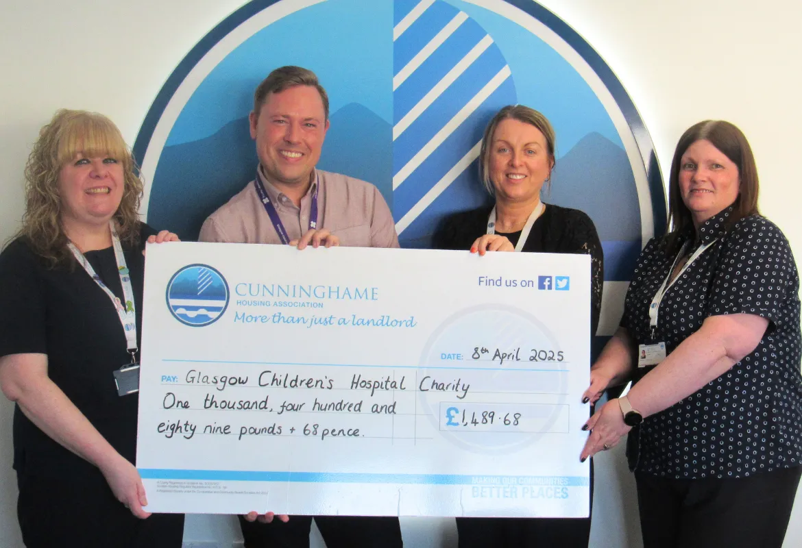 staff with cheque