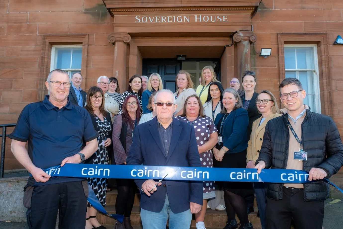 tenants and a banner saying cairn