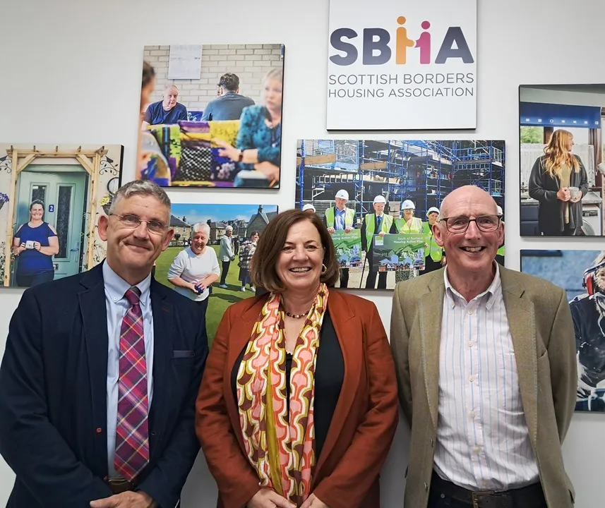 Incoming Chair Ian McDonald (left) with SBHA Chief Executive Julia Mulloy and outgoing Chair Robin Hill.