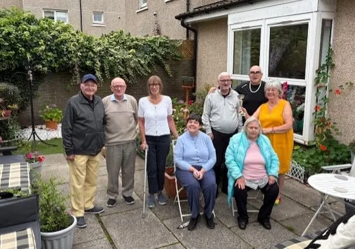 group on tenants in their garden