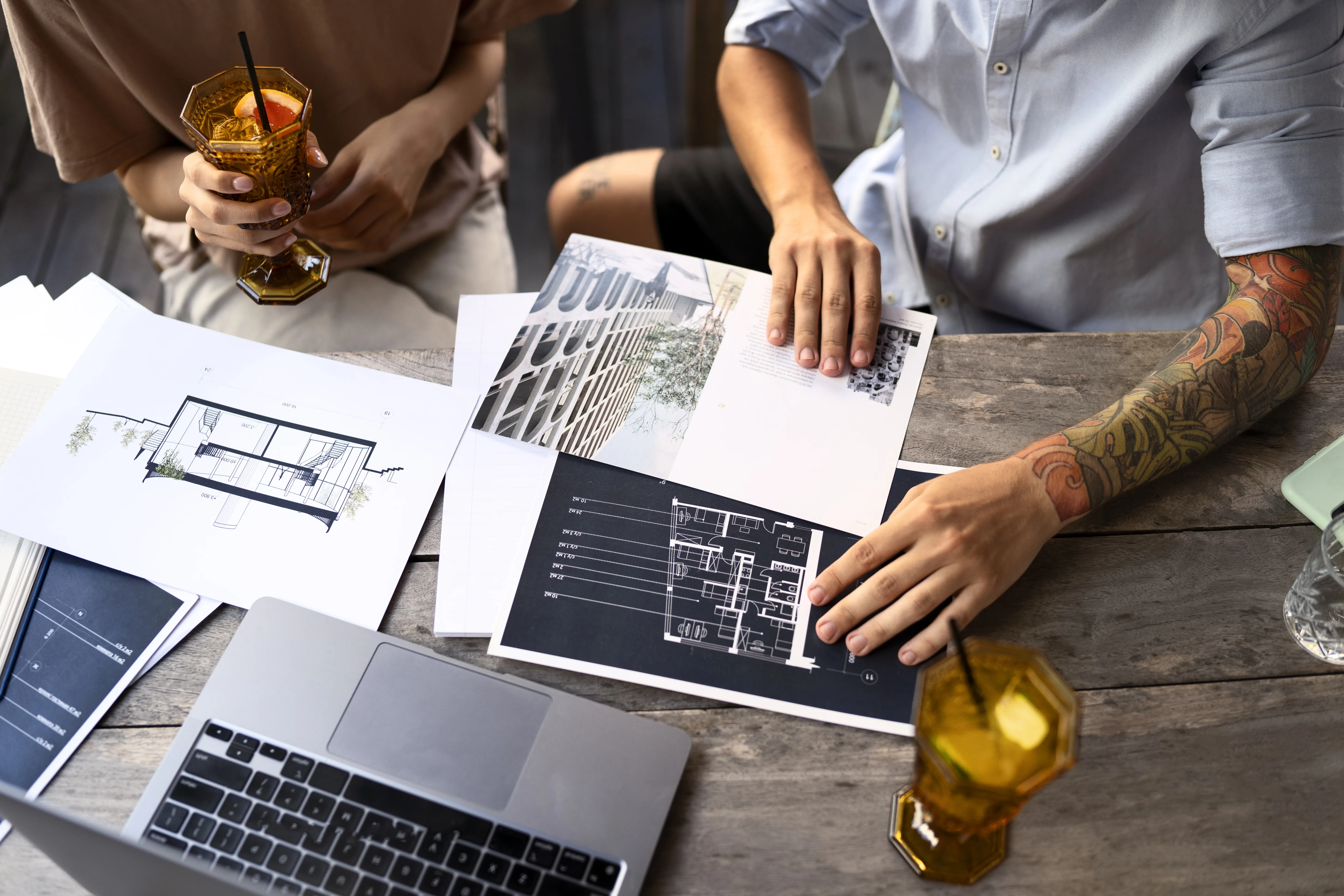 laptop and construction plans
