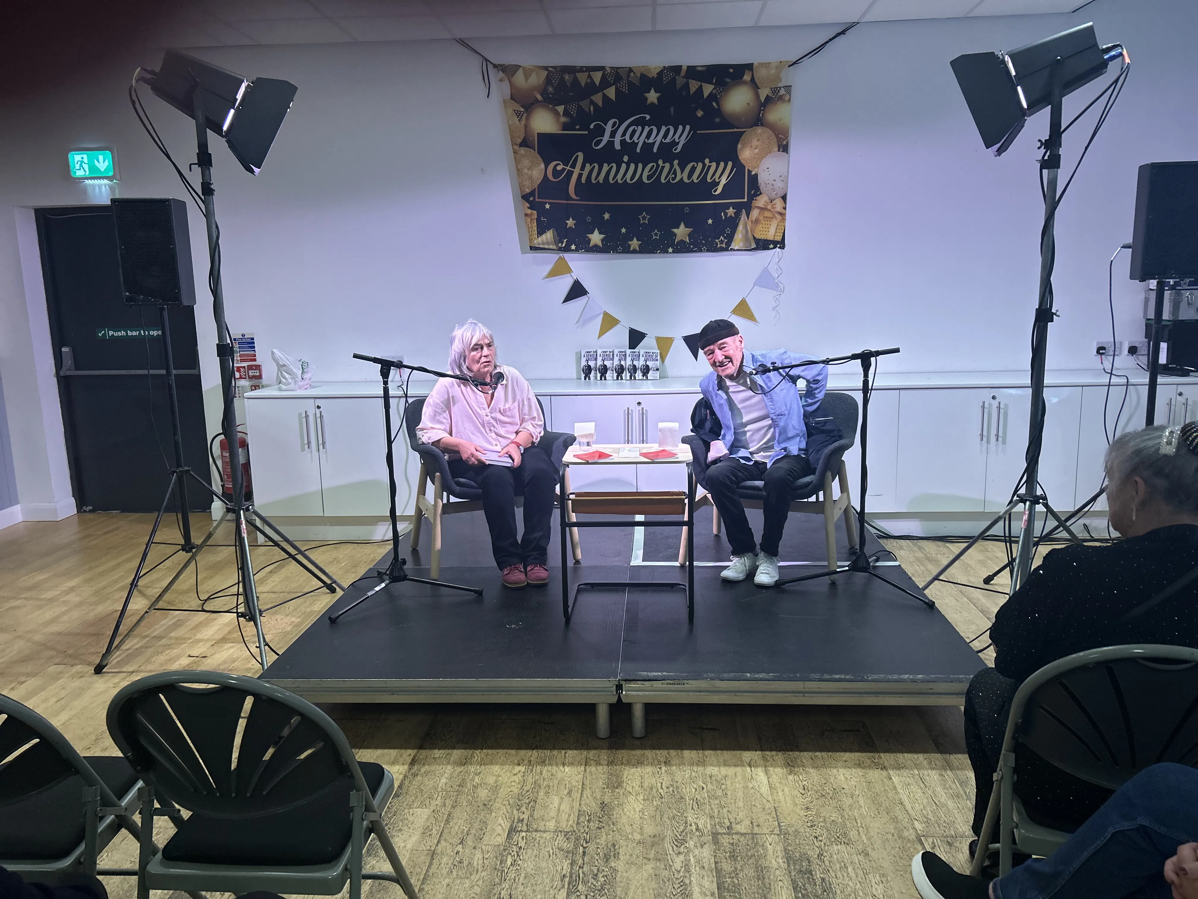 david hayes and woman on stage