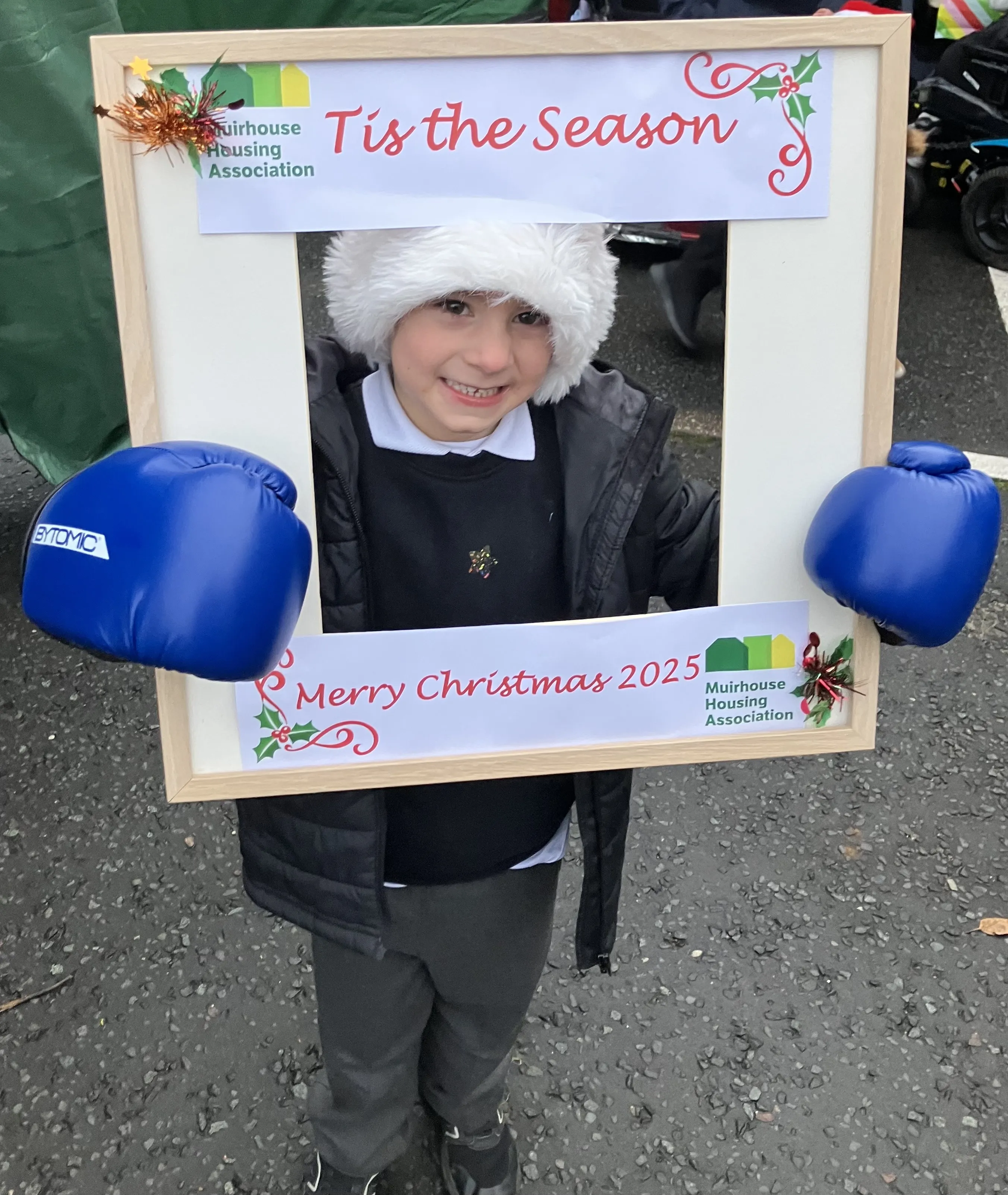child in christmas selfie frame