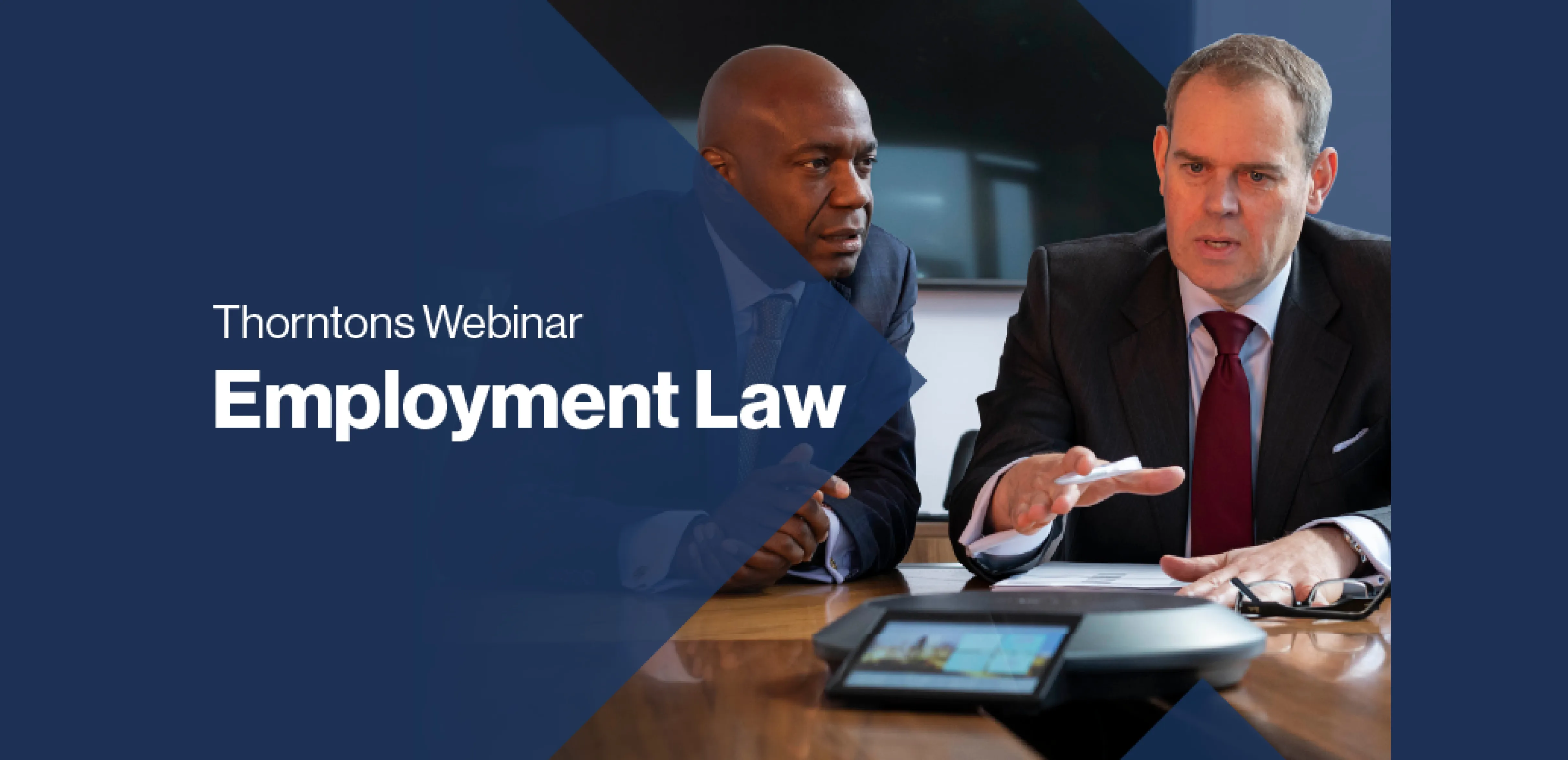 thorntons employment law. Image: two men in suits looking at documents